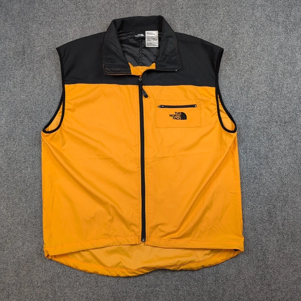 Colete externo The North Face vintage amarelo e preto corta-vento concha GG - Imagem 1 de 4