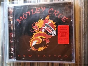 ORIGINAL MOTLEY CRUE New Tattoo CD USA EDITION HYPE STICKER SEALED GLAM METAL - Foto 1 di 4