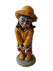 Norwegian Candy Figurine Little Girl in Yellow Coat Hat and Mittens - Picture 1 of 4