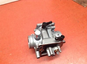 NEW KAWASAKI 08-12 PRAIRIE 360 CARB HOUSING / BODY - Picture 1 of 1