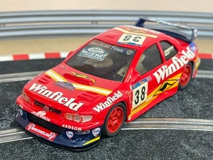 1423- Scalextric Team Slot SUBARU IMPREZA #38 Winfield Participó en Cto. España - Imagen 1 de 3