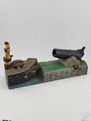 Vintage Reproduction Book of Knowledge Cast Iron Cannon Mechanical Bank.  - Image 1 of 4