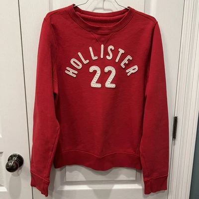 Sudadera cómoda Hollister 22 para mujer elevada blanca con letras rojas talla grande Foto 1 de 4