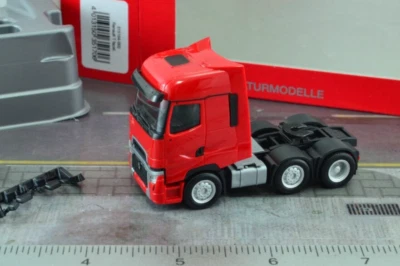 3-осный тракторный блок для грузовика Herpa 351706 Renault T Facelift красный масштаб 1:87 HO - Изображение 1 из 4