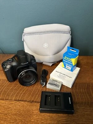 Canon PowerShot SX40 HS 12.1MP Camera Flip Screen New Batt, Charger & Sling Bag - Image 1 of 4