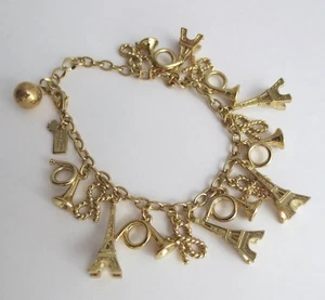 KATE SPADE Parisian Lights Gold Charm Bracelet ~ Eiffel Tower, Bow, French Horn - Picture 1 of 10