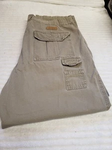 Pantalones de excursionista Cabela’s 7 bolsillos 40x32 beige senderismo camping al aire libre - Imagen 1 de 12