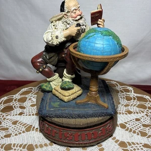 Estatuilla de caja de música vintage Norman Rockwell Navidad Santa Globe cuerda - Imagen 1 de 17