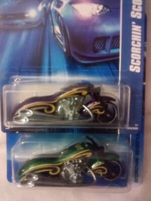 Hot Wheels Scorchin' Scooters from 2006 #183 1 green 1 purple- small crease top - Image 1 of 4
