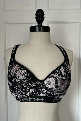 Sujetador push-up elástico con aros acolchado floral negro BEBE SPORT talla L Foto 1 de 3