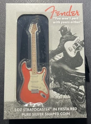Moneda de plata Suiza 2022 de una oz: guitarra Stratocaster en forma - rojo Fiesta Foto 1 de 4