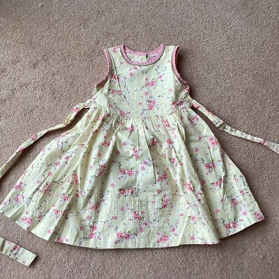 CAMILLA GIRLS 4 SUNDRESS, SLEEVELESS, FLORAL ON YELLOW, BACK BUTTONS, LINED,SASH - Image 1 of 4