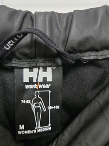HELLY HANSEN Aden Rain Pants Women M Black Waterproof Drawstring Tech - Picture 1 of 4