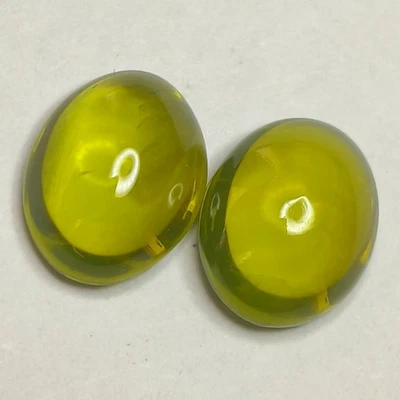 3.87Cts EXCLUSIVE NATURAL PAKISTAN PERIDOT CAB OVAL SHAPE PAIR. - Image 1 of 4