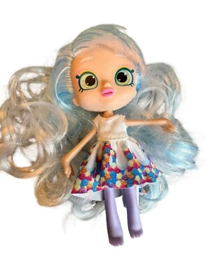 Muñeca Shopkins Juguete Rizado Morado - Mini Muñeca de Pelo con Vestido Colorido Foto 1 de 4
