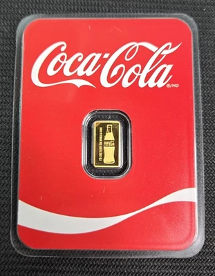 1/2 GRAM .999 FINE GOLD COCA-COLA BAR IN ASSAY CARD - Image 1 of 3