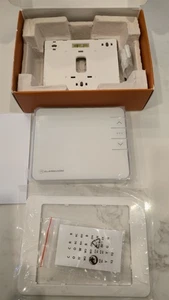 alarm.com T2000 smart Zwave thermostat is new in  factory box,box shows wear - Picture 1 of 9