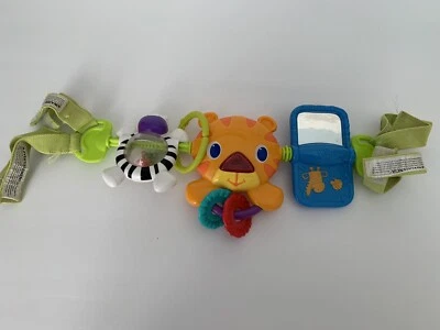 Bright Starts Transportador Toy Bar Asiento Coche Actividad 4 Melodías Foto 1 de 4