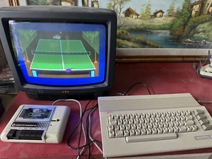 COMMODORE 64 + datassette 1530 C2N Floppy 154I + MPS1270 + Games + Joystick - Foto 1 di 23