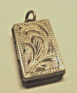 STERLING SILVER VINTAGE CHARM BRACELET CHARM SMALL RECTANGULAR LOCKET OPENS - Picture 1 of 2