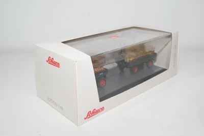 B95 1:43 SCHUCO 45 031 3300 SET MERCEDES-BENZ UNIMOG 401 CON RIMORCHIO MIB - Immagine 1 di 4