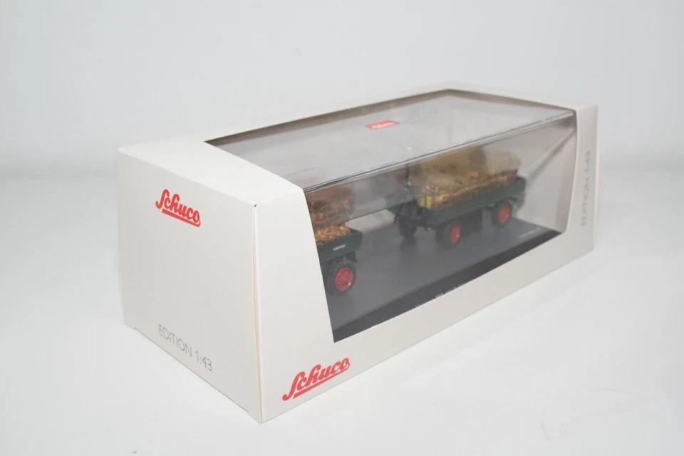 B95 1:43 SCHUCO 45 031 3300 SET MERCEDES-BENZ UNIMOG 401 CON RIMORCHIO MIB - Immagine 1 di 4