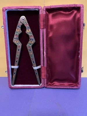 Brass Nutcracker With Inlaid Multi-Colored Glass Pieces In Red Fabric Case - Image 1 of 4