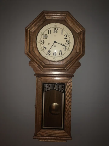 1984 Regulator 40” wall clock with pendulum and key and original owners manual Cover