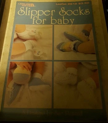 AL7 LEISURE ARTS 1994, SLIPPER SOCKS FOR BABY, 8 CROCHETED DESIGNS  - Image 1 of 2