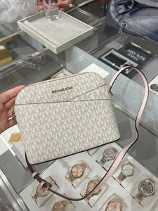 MICHAEL KORS MK JET SET TRAVEL DOME XCROSS CROSSBODY BAG VANILLA PINK - Picture 1 of 5