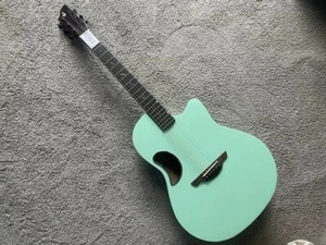 Guitarra acústica Ovation Singer verde metálico de fibra de carbono - Imagen 1 de 10