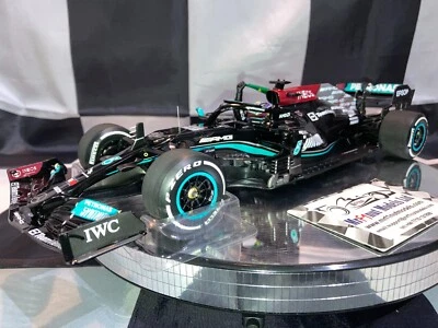 1:18 Minichamps Lewis Hamilton Mercedes AMG W12 Vincitore GP Brasiliano 2021 - Immagine 1 di 4