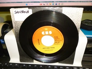 SANTANA. " SHE'S NOT THERE " 7" VINYL SINGLE. UK 1977. NM COND. - Picture 1 of 2