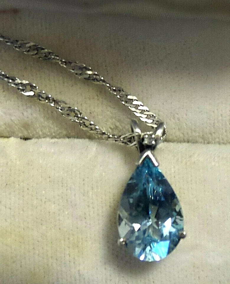  3CT. COLGANTE GOTA LÁGRIMA TOPACIO AZUL CON DIAMANTE .2 EN CADENA PLATA 925 18" Foto 1 de 3