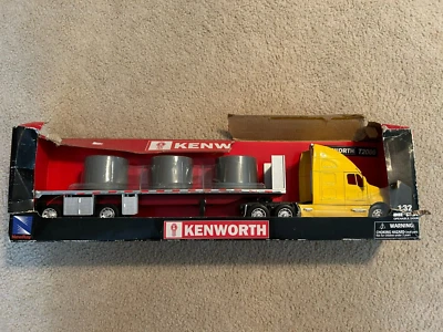 NEWRAY KENWORTH T2000 Long Hauler Платформа с Калвертами, Желтый 1:32 - Изображение 1 из 4