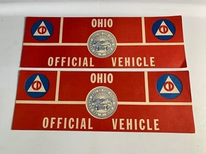 (2) VINTAGE CIVIL DEFENSE OHIO OFFICIAL VEHICLE LICENSE PLATE TOPPER SIGN - Picture 1 of 10