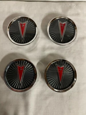 1977-1987 PONTIAC WIRE WHEEL MEDALLION GM 10035767 NOS 1 SET OF 4 - Image 1 of 4