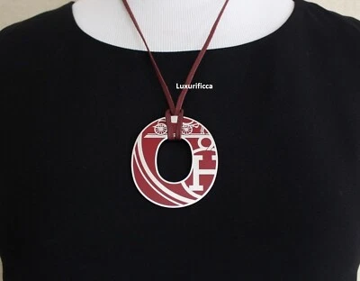 AUTÉNTICO. De colección.  Collar de cuerda de cuero Hermes colgante icónico Hermes Foto 1 de 4