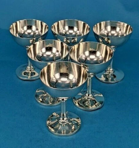 A miniature Art Deco silver set of six decadent solid silver champagne goblets Cover