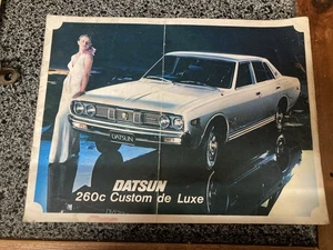 Oldtimer Nissan 260C Limousine Verkaufsprospekt Falz/Knitter in der Mitte - Bild 1 von 5
