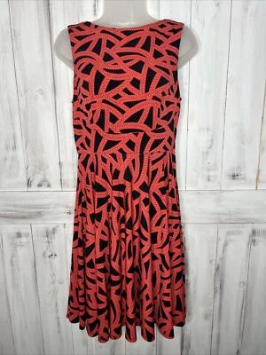 VESTIDO ACAMPANADO DONNA MORGAN ROJO NEGRO SIN MANGAS CUERDA CON BANDAS CINTURA CAMBIO SWING 4 Foto 1 de 4