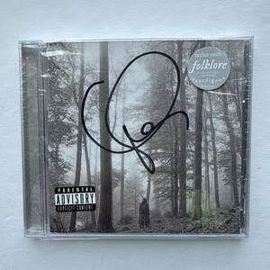 Folleto CD Folklore Autógrafo Firmado Taylor Swift NUEVO/SELLADO - Imagen 1 de 2