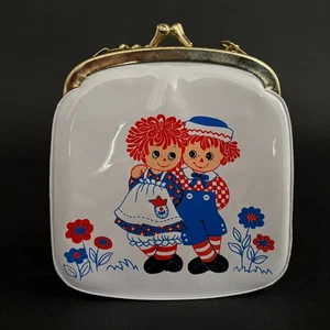 Monedero vintage Hallmark 1975 Raggedy Ann and Andy vinilo tono dorado 4" NUEVO - Imagen 1 de 7