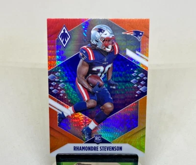 2021 Panini Phoenix NFL Football Fire Burst 133 Rhamondre Stevenson RC Patriots - Image 1 of 4