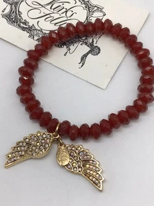 Kirks Folly Peace Paradise Red Beaded Angel Wings Stretch Bracelet Gold Tone - Picture 1 of 5