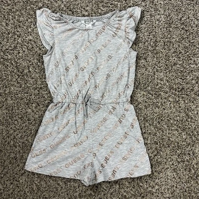 Mameluco gris Guess para niñas talla 6X estampado dorado sin mangas con volantes cordón cintura Foto 1 de 4