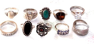 KONVOLUT MIT 10 SILBERRINGEN;925er(2x835)49,8g,SAPHIR;ONYX;BERNSTEIN;TÜRKIS;ETC - Bild 1 von 11