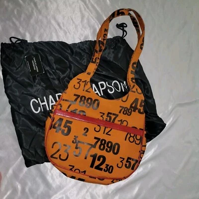 CHARLIE LAPSON LARANJA E PRETO NÚMEROS UBRAN BOLSA HOBO E BOLSA DE PÓ  - Imagem 1 de 4