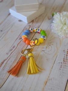 Field of Flowers Stretch Silicone Wristlet Key Chain Bracelet Matching Tassels - Picture 1 of 10