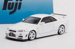 Modelo de metal fundido a presión deportivo Fuji Skyline GTR R34 Nismo Z-Tune escala 1:64 blanco - Imagen 1 de 5